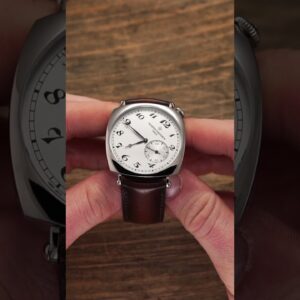 Why is this watch dial crooked?